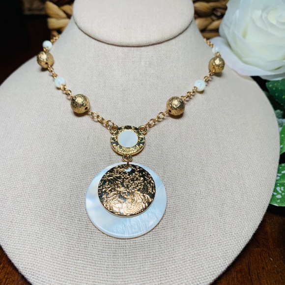Jewelry - White Mother of Pearl and Etched Gold tone Pendant Necklace.